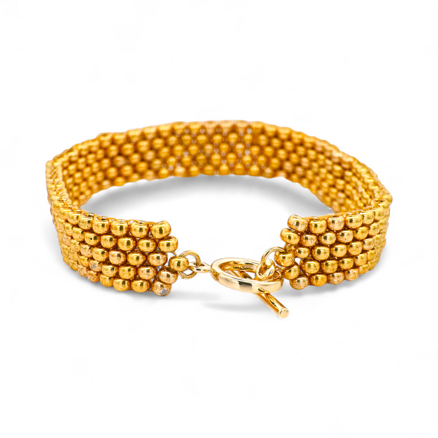 Pulsera tejida a mano miyuki dorada