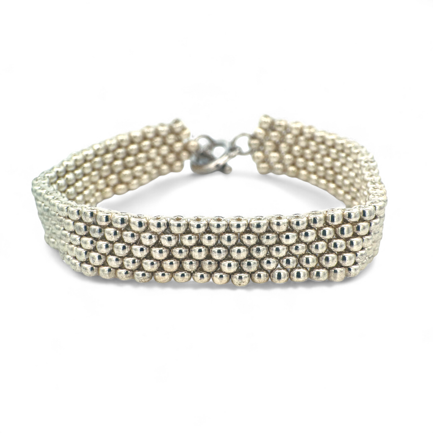 Pulsera tejida a mano miyuki plateada