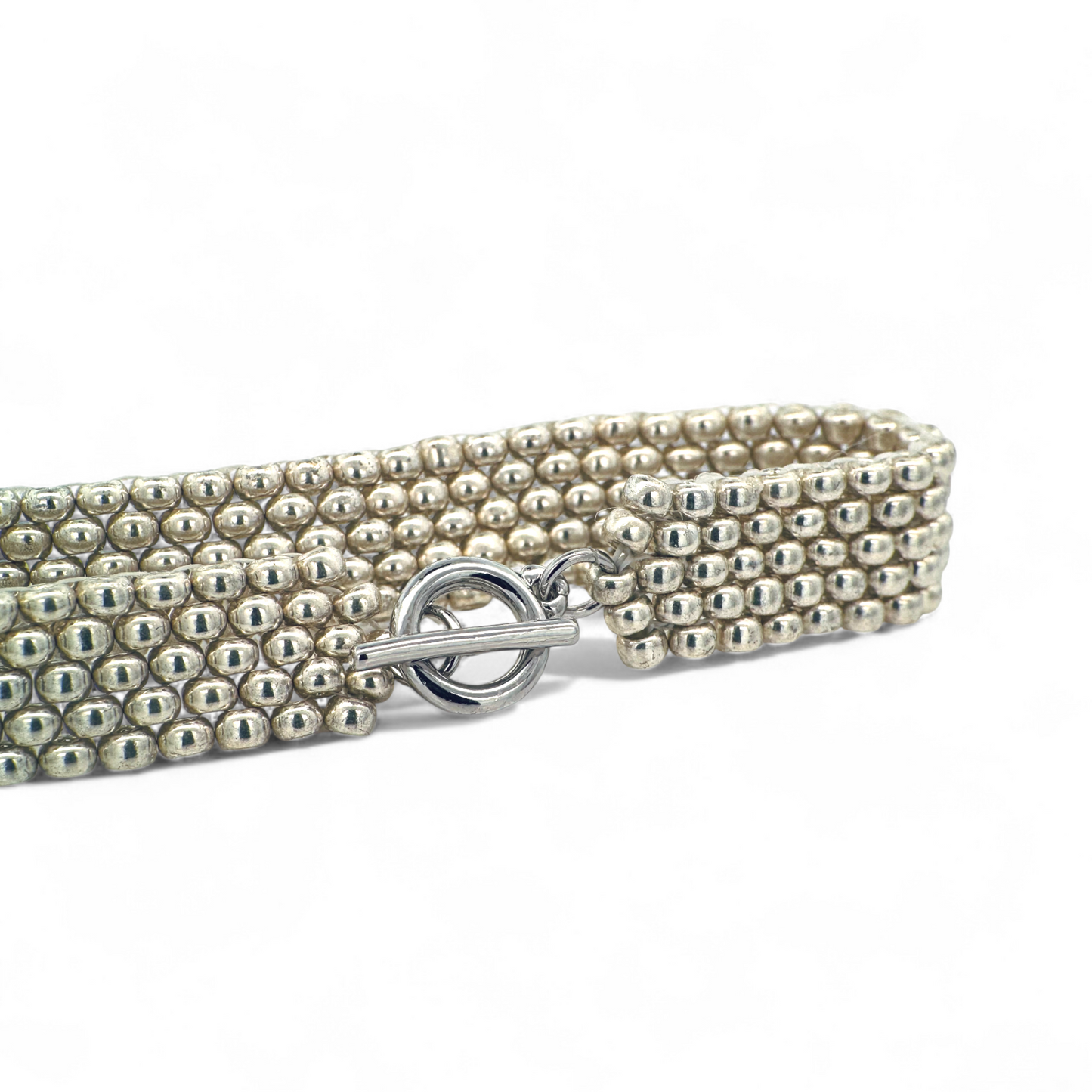 Pulsera tejida a mano miyuki plateada