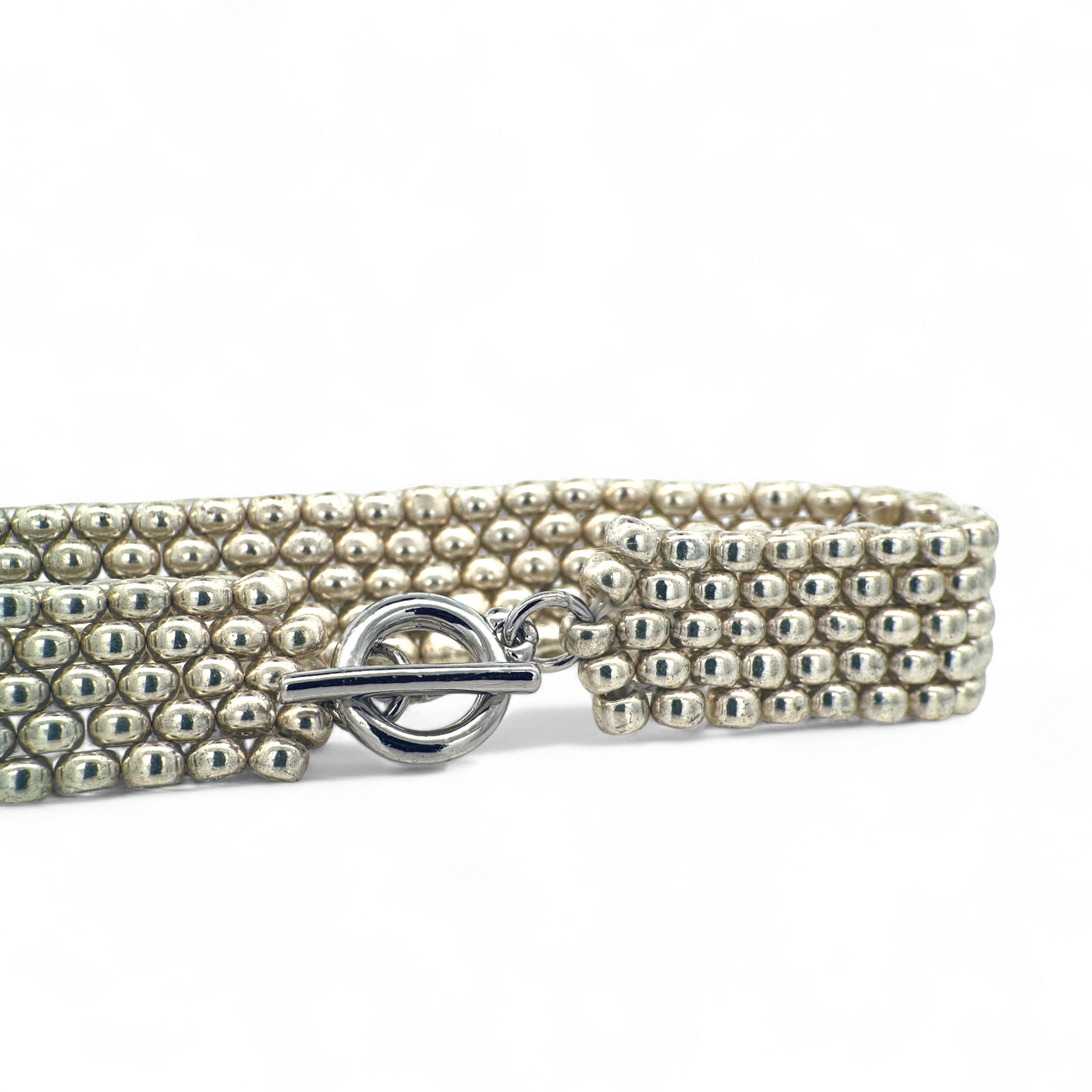 Pulsera tejida a mano miyuki plateada
