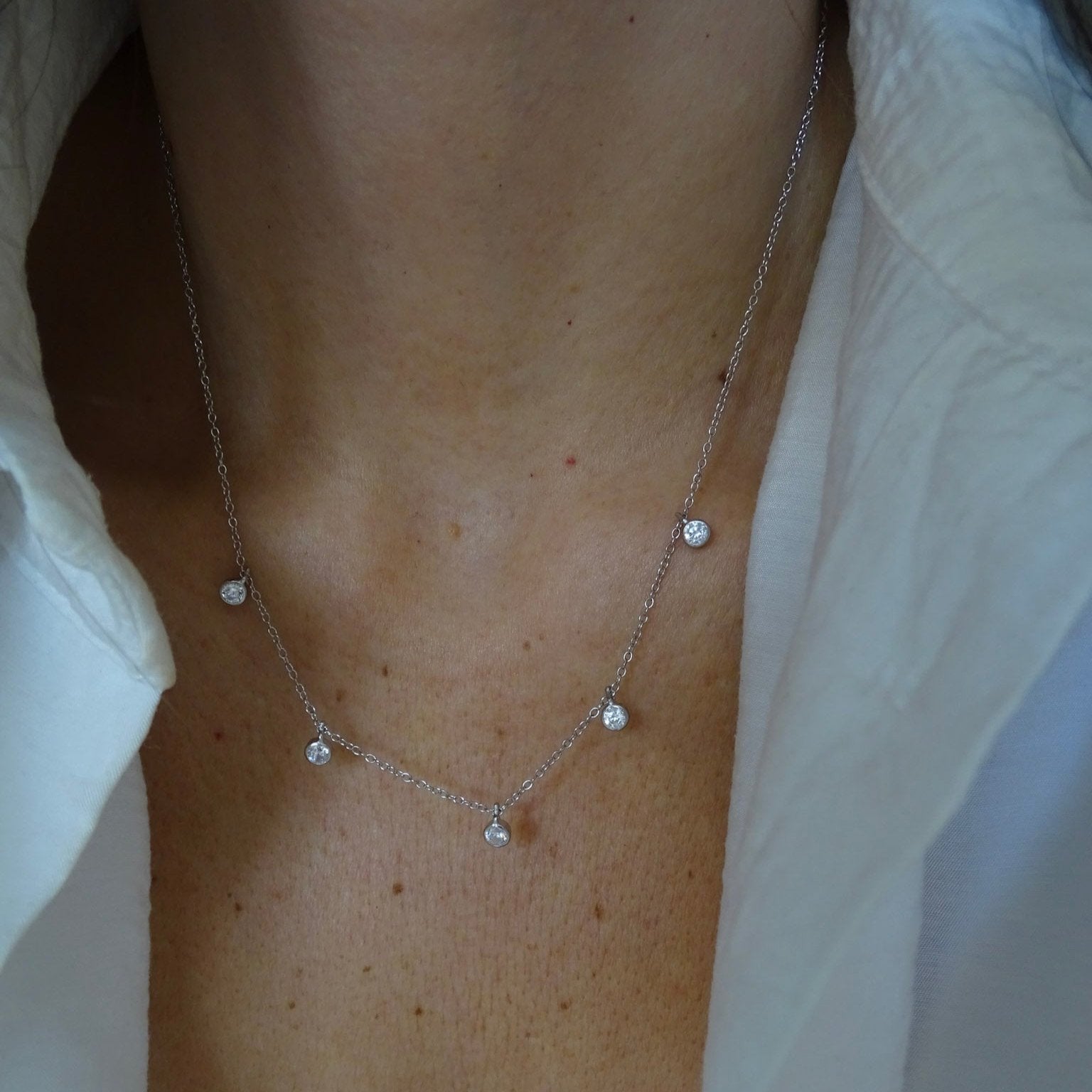 Collar cadena con cinco circones en bisel de Plata 925