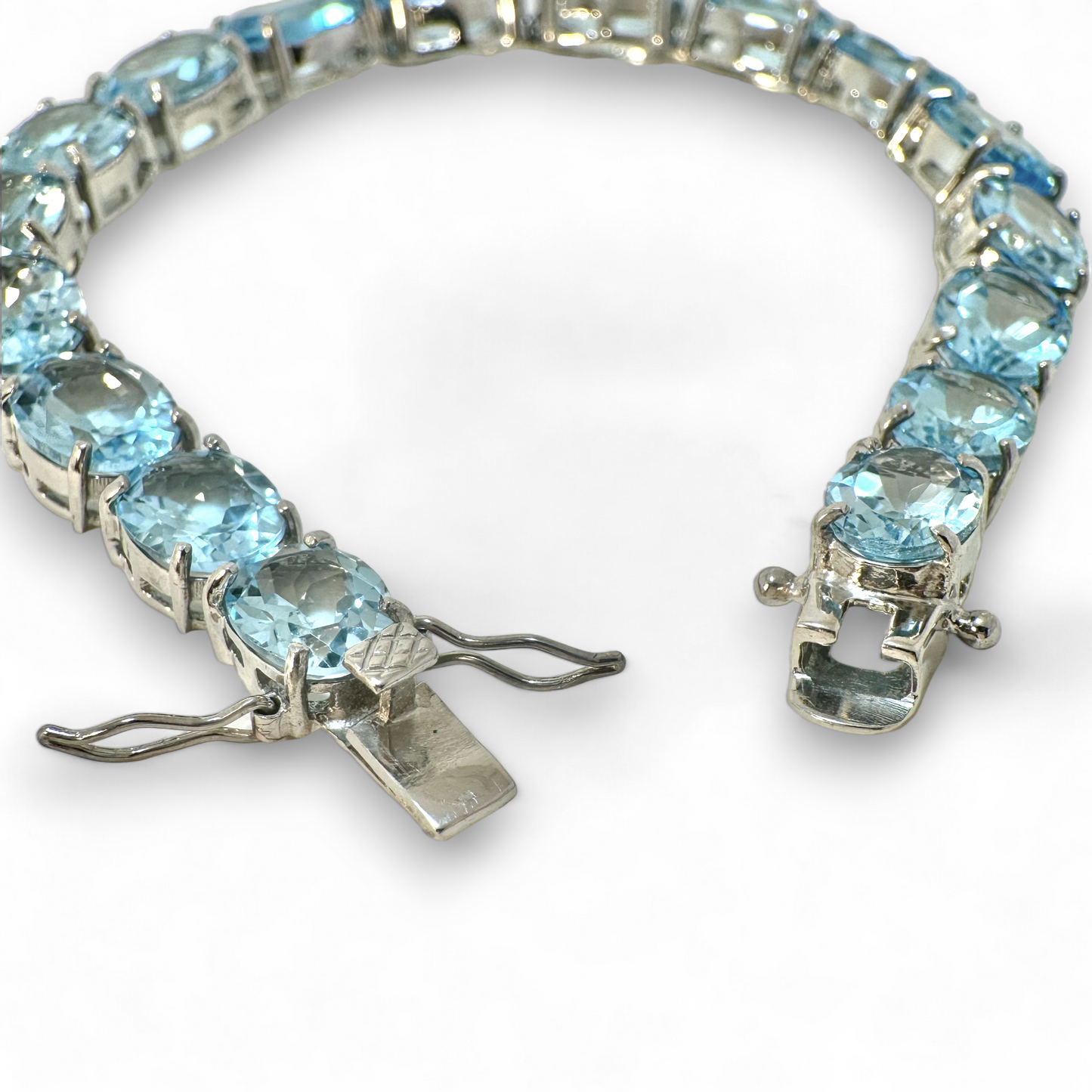 Pulsera topacios azules ovales en grifa hecha en plata 925