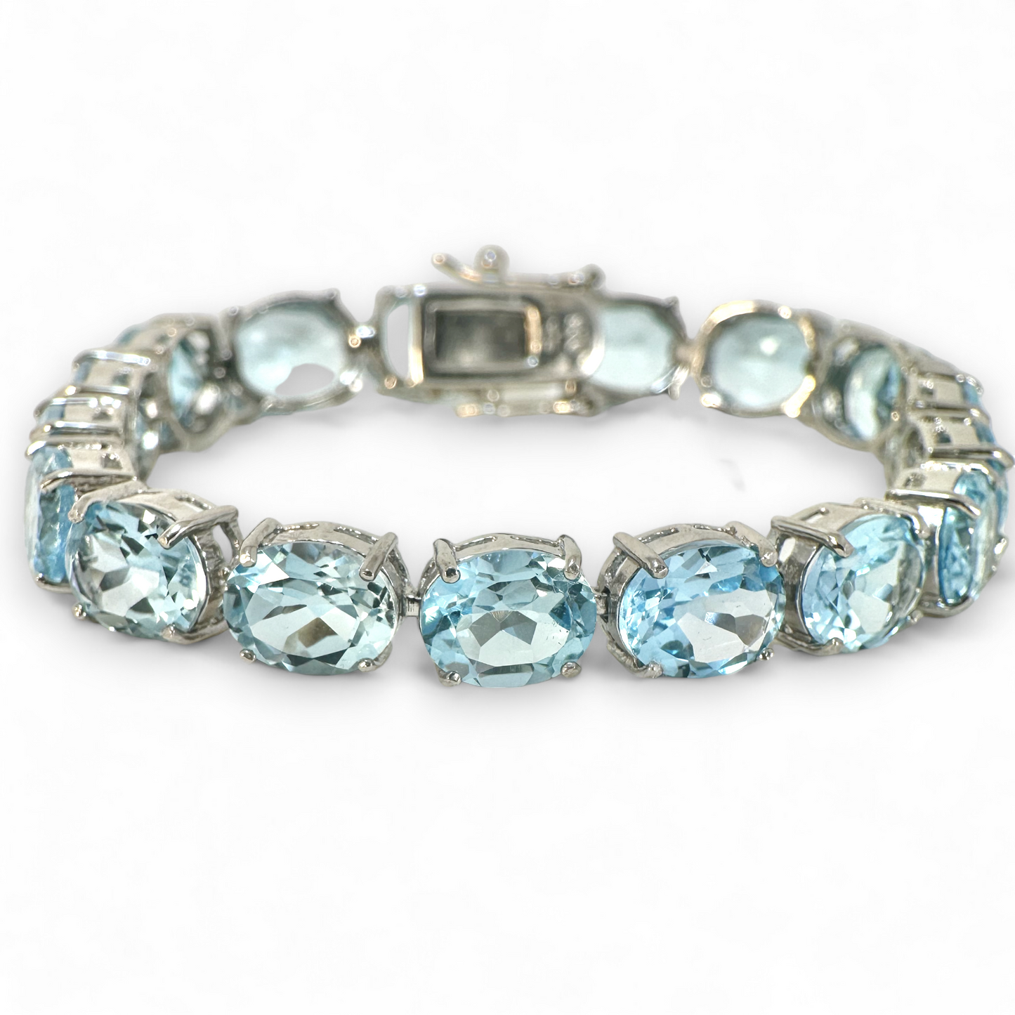 Pulsera topacios azules ovales en grifa hecha en plata 925