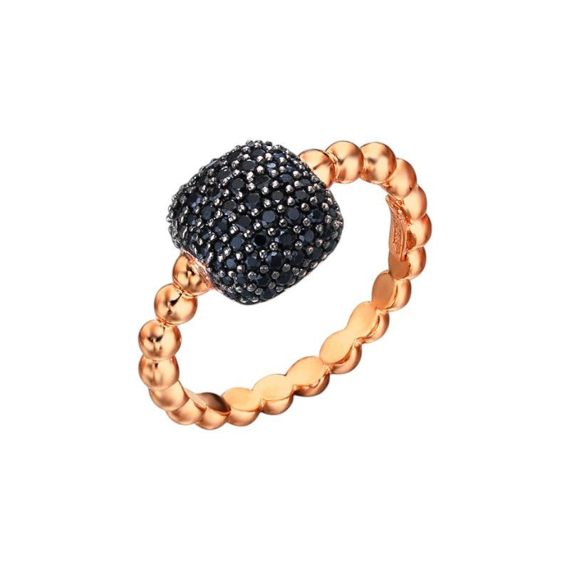 Anillo bolitas y circonitas negras plata baño oro rosado