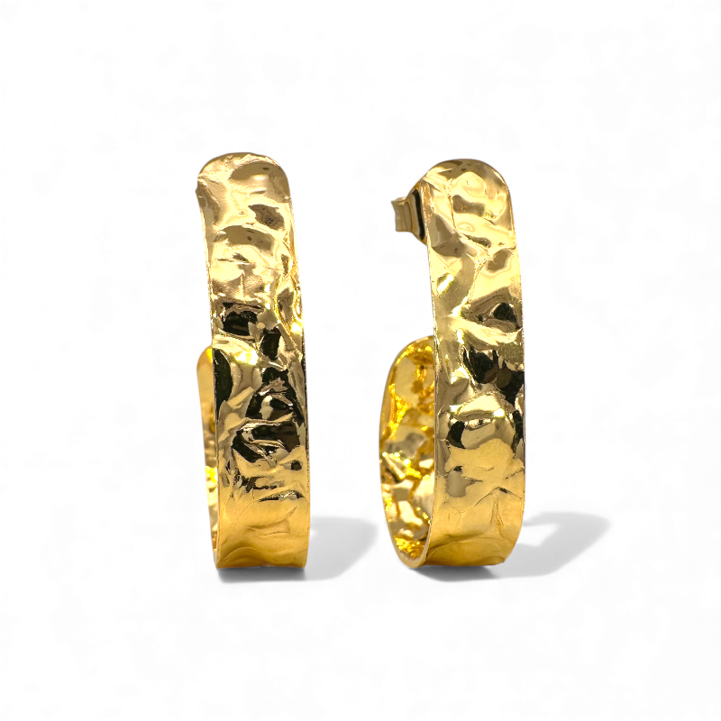 Aros ovales efecto martillado doradas 3 cm