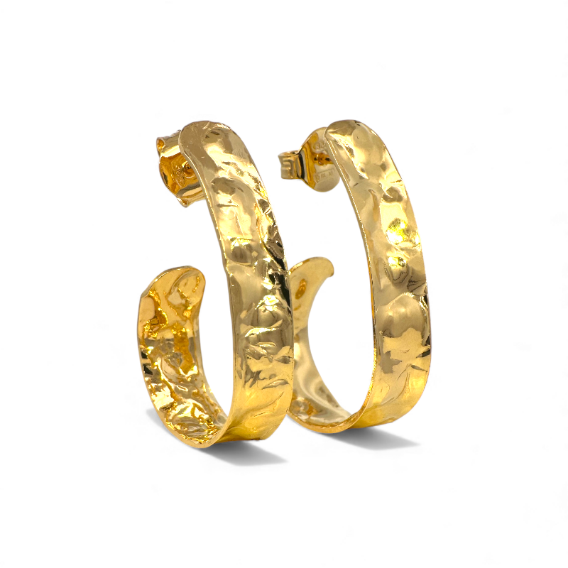 Aros ovales efecto martillado doradas 3 cm