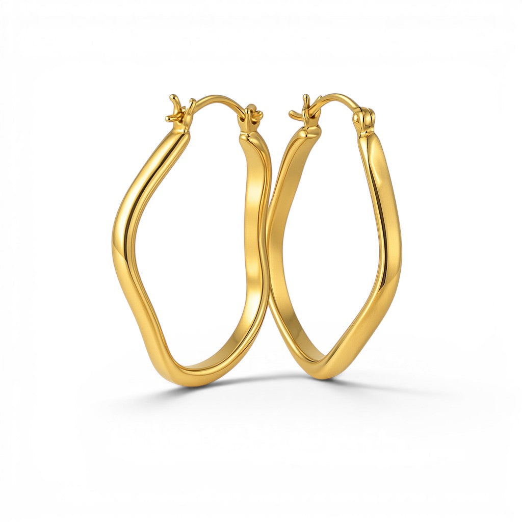 Aros argollas ovales torcidas doradas 2,3 x 3 cm