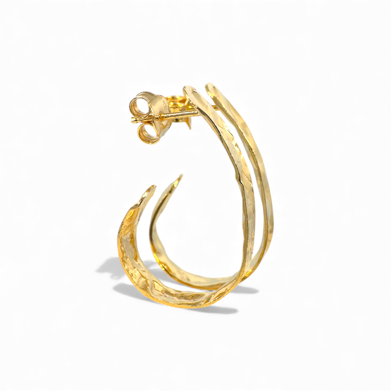 Aros ovales efecto martillado doradas 3 cm