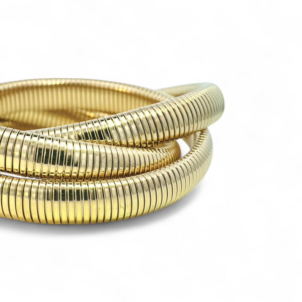 Pulseras triples de bronce doradas