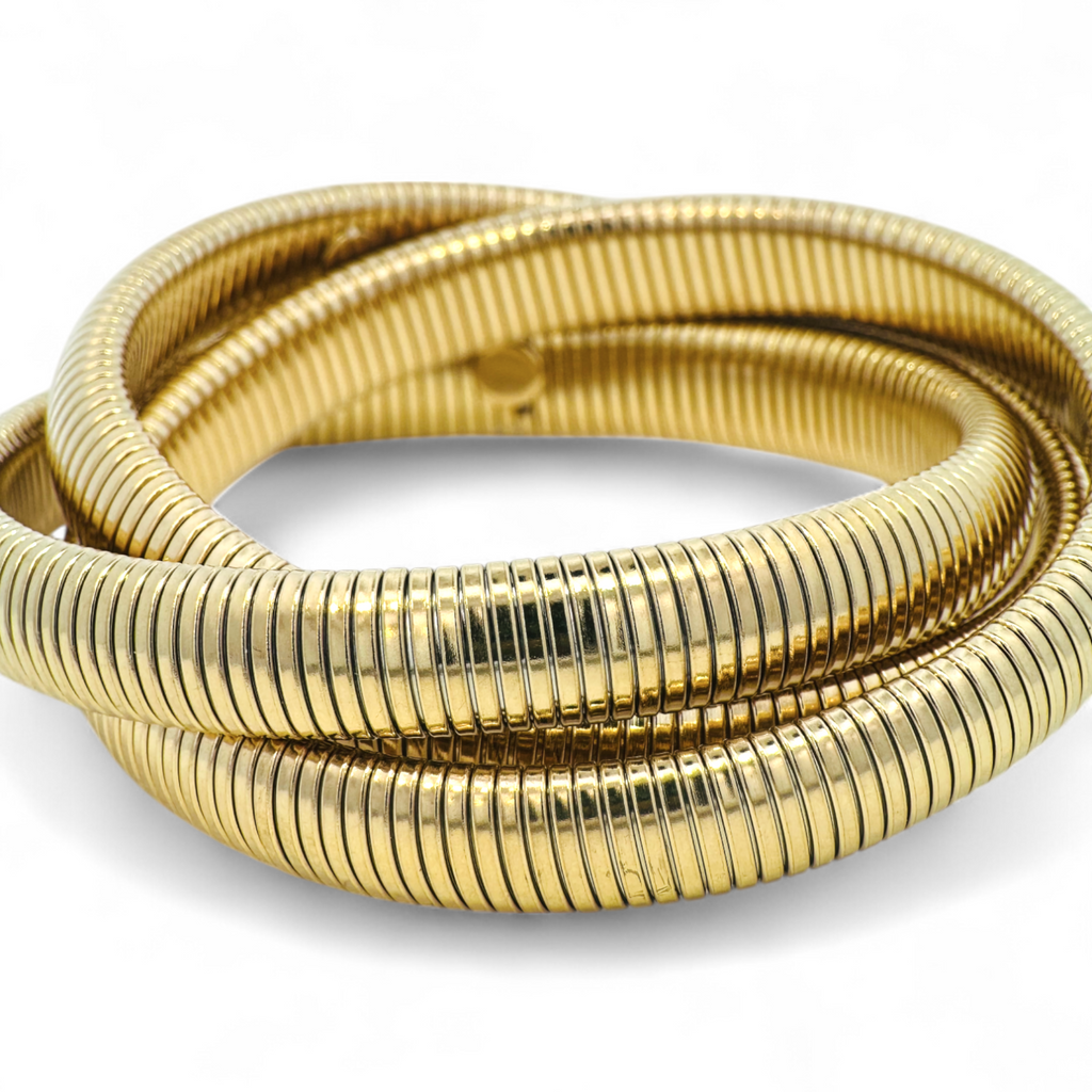 Pulseras triples de bronce doradas