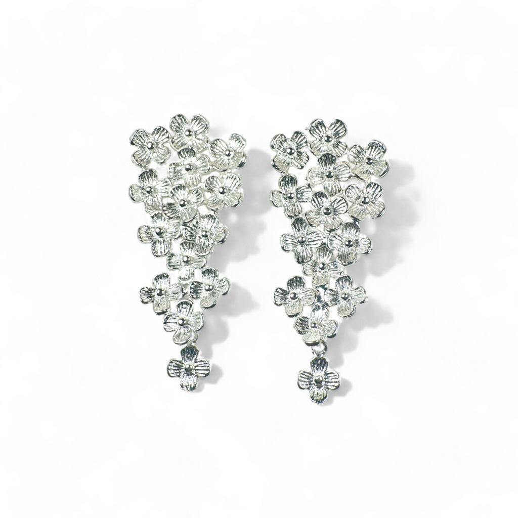 Aros flores gota movimiento plateados