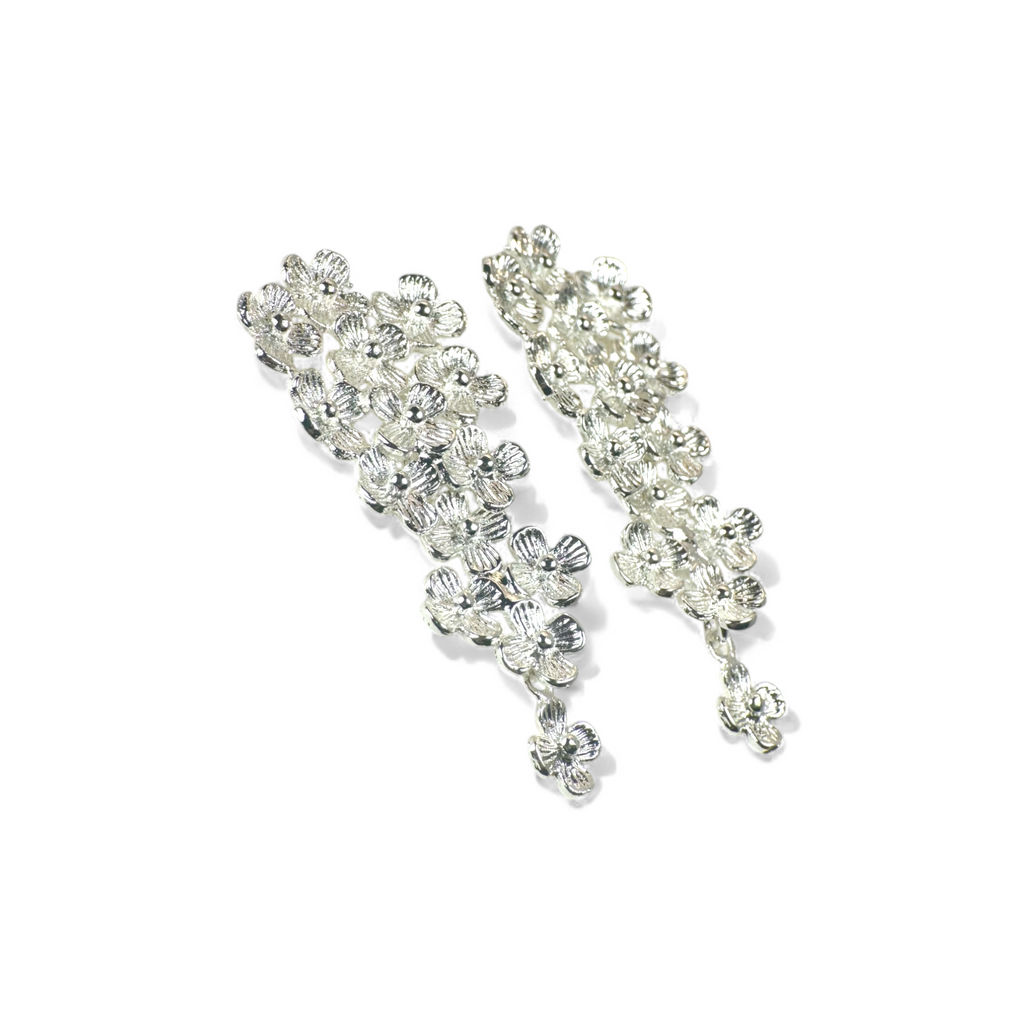 Aros flores gota movimiento plateados