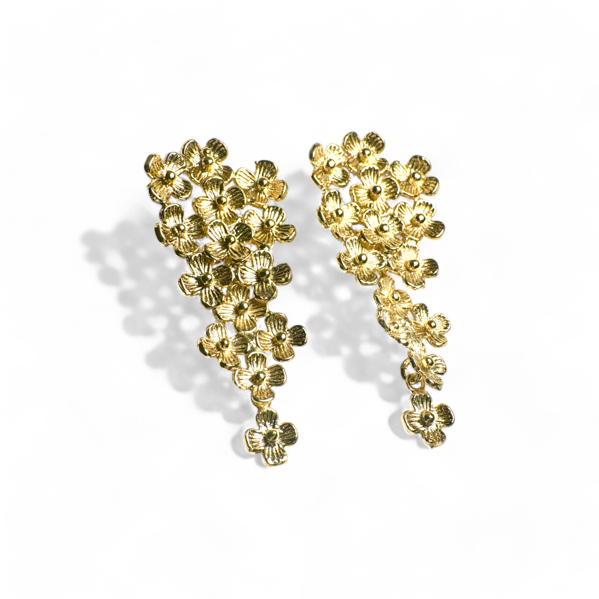 Aros flores gota movimiento dorados