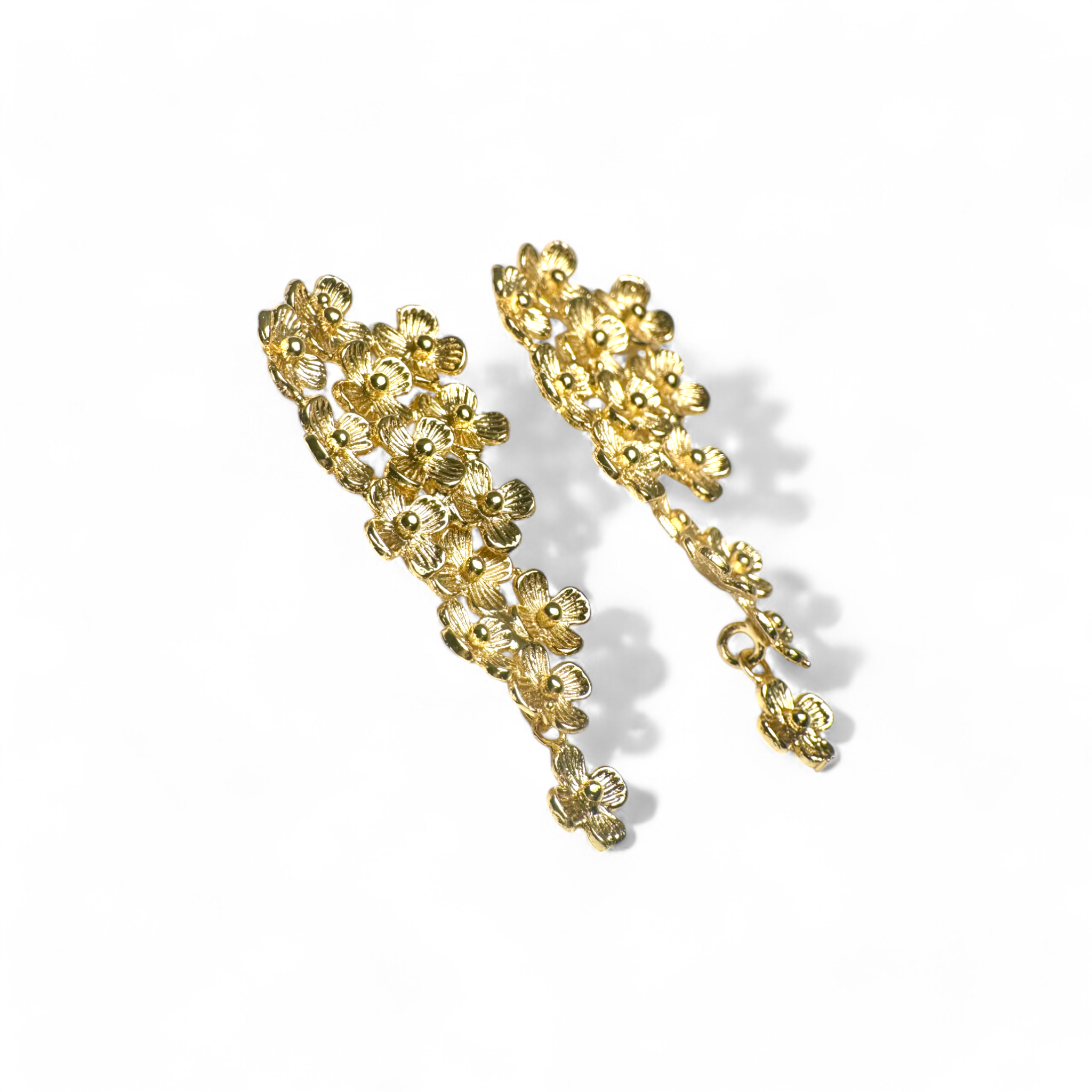 Aros flores gota movimiento dorados