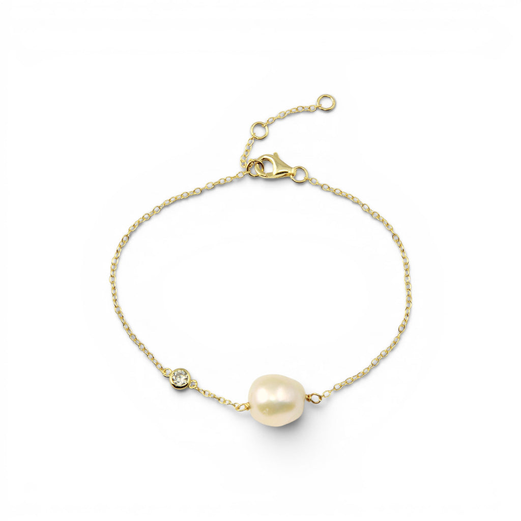 Pulsera Perla Oval 9 mm y circón bisel dorada