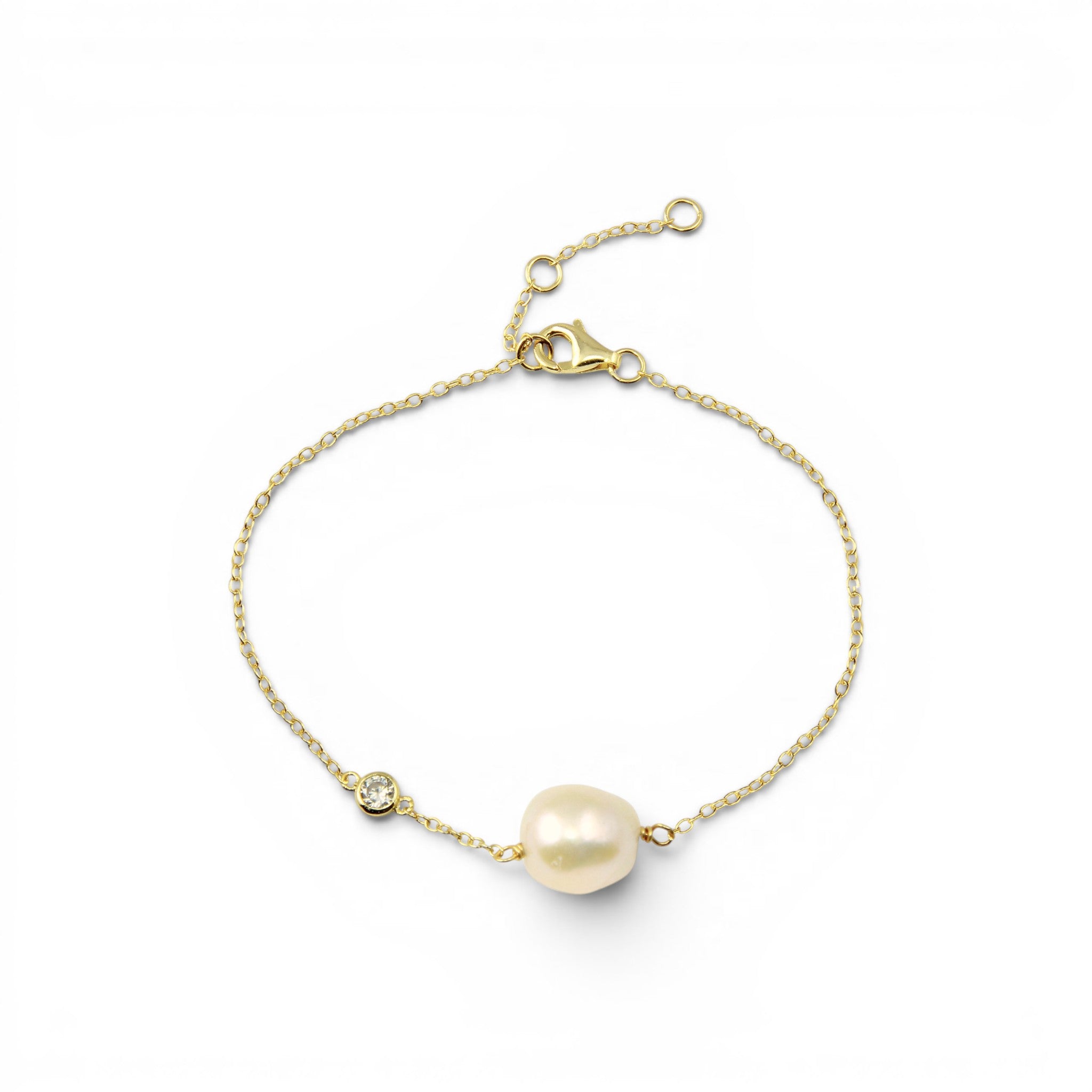 Pulsera Perla Oval 9 mm y circón bisel dorada