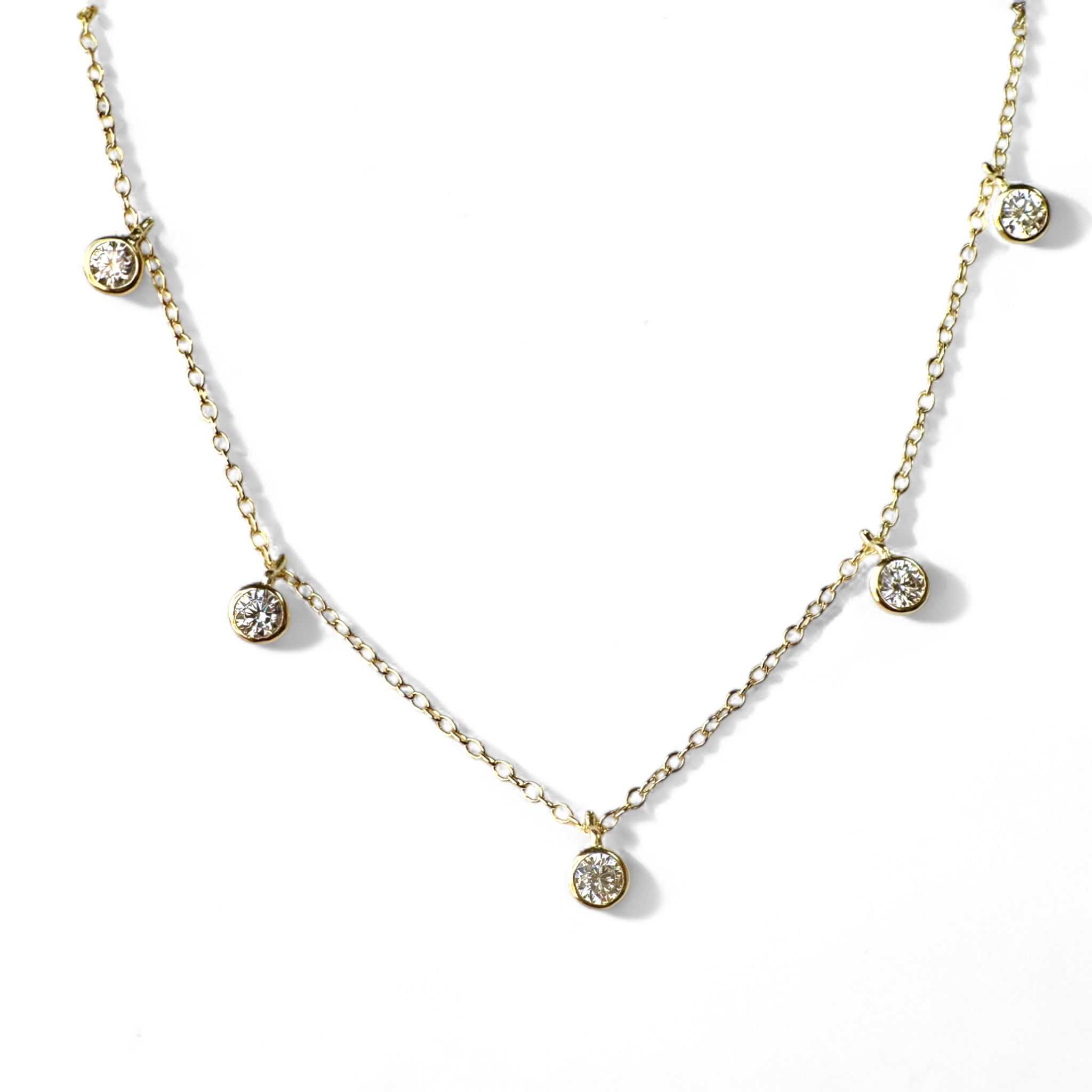 Collar cadena con cinco circones en bisel de Plata 925 bañado en oro