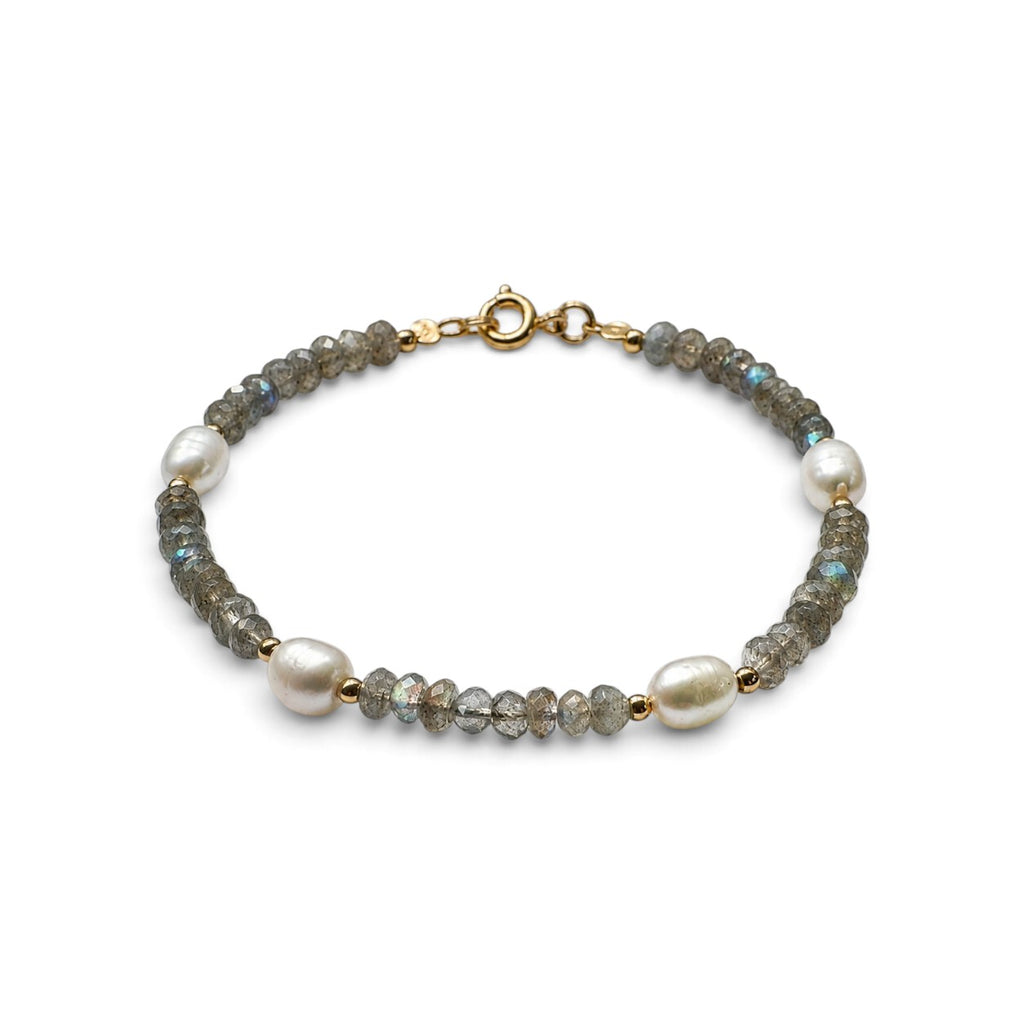 Pulsera ClaraJoyas de piedras naturales grises facetadas y tres perlas blancas con cierre dorado ajustable