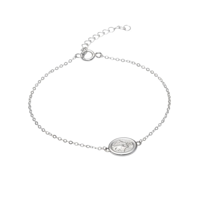 ClaraJoyas sterling silver 925 bracelet with 11mm oval Virgin medal, adjustable 15-19cm. Delicate, meaningful, daily wear.