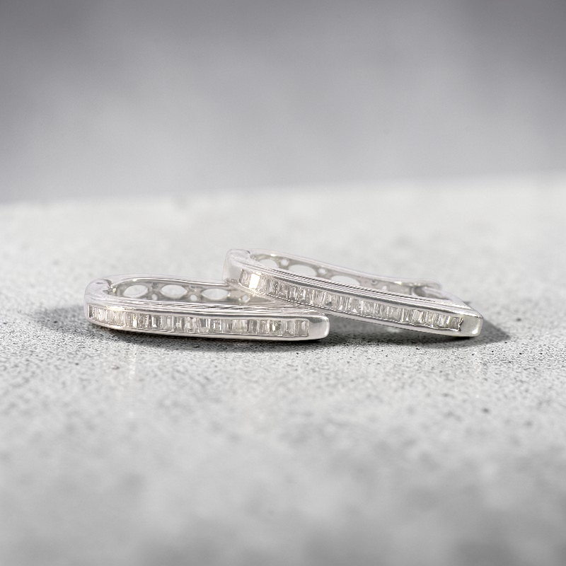 Aros argollas ovales curvas diamantes baguette en riel 0,25 ct plata 925