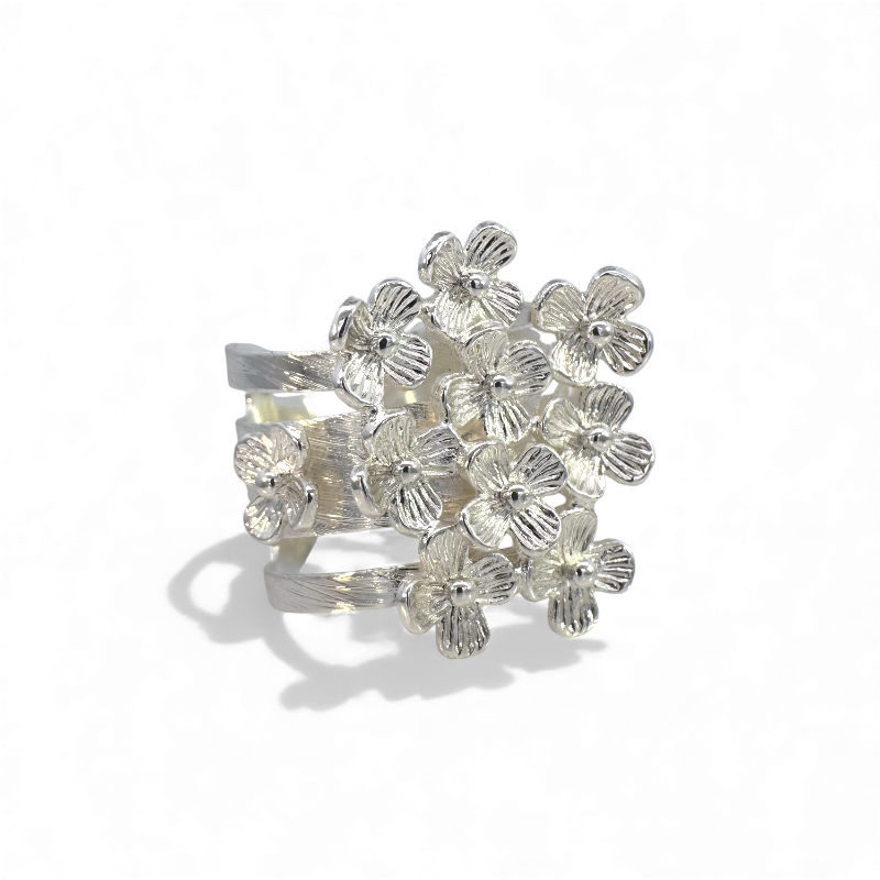 Anillo ajustable flores plateado