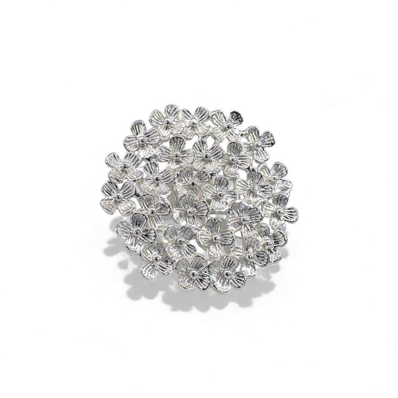 Anillo ajustable flores plateado grande