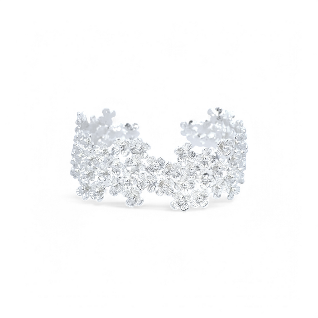 Pulsera esclava ajustable flores plateada angosta
