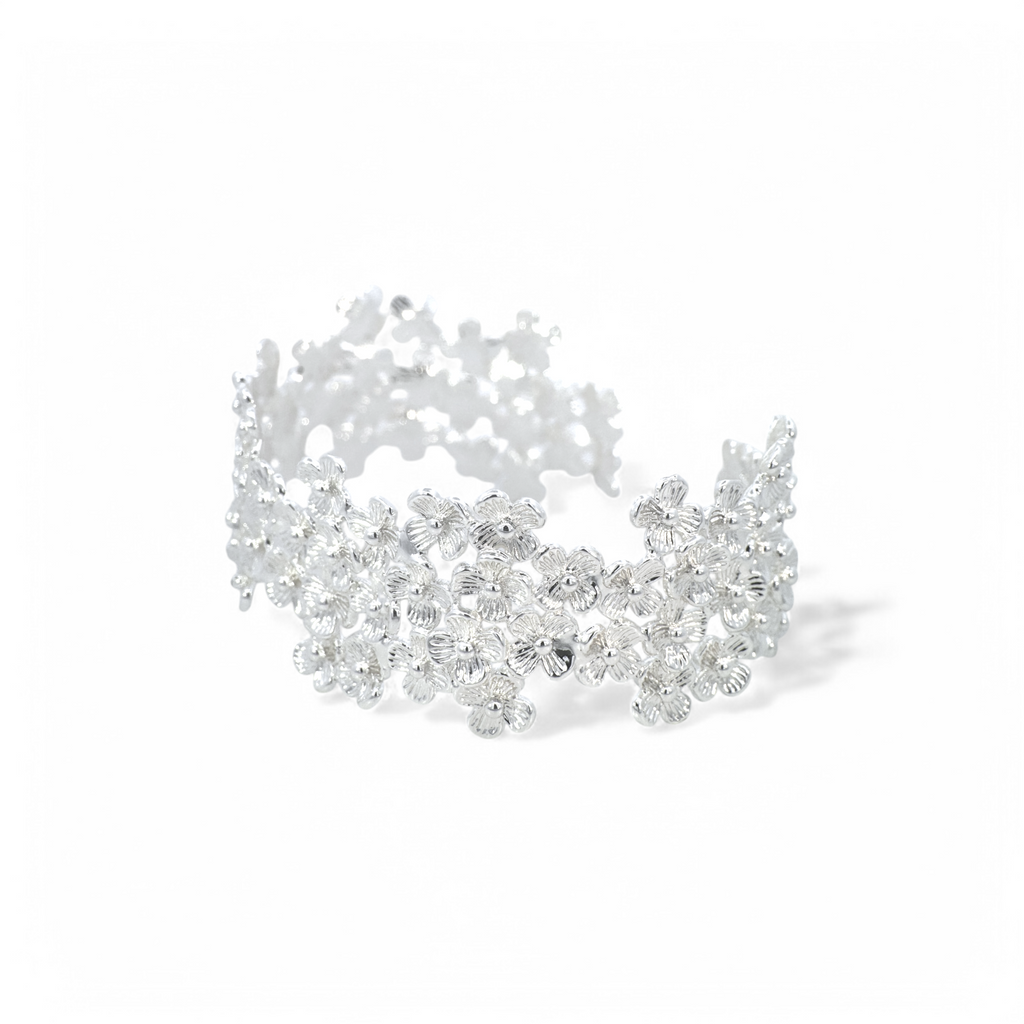 Pulsera esclava ajustable flores plateada angosta