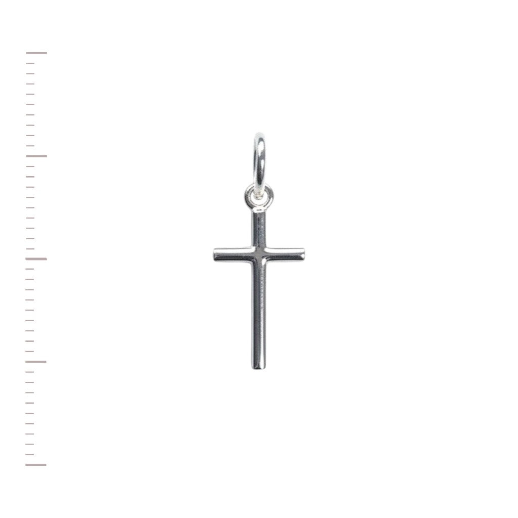 Dije de cruz minimalista en plata 925 de Sophia Schneider Joyas, diseño pequeño y elegante de 7x14 mm.