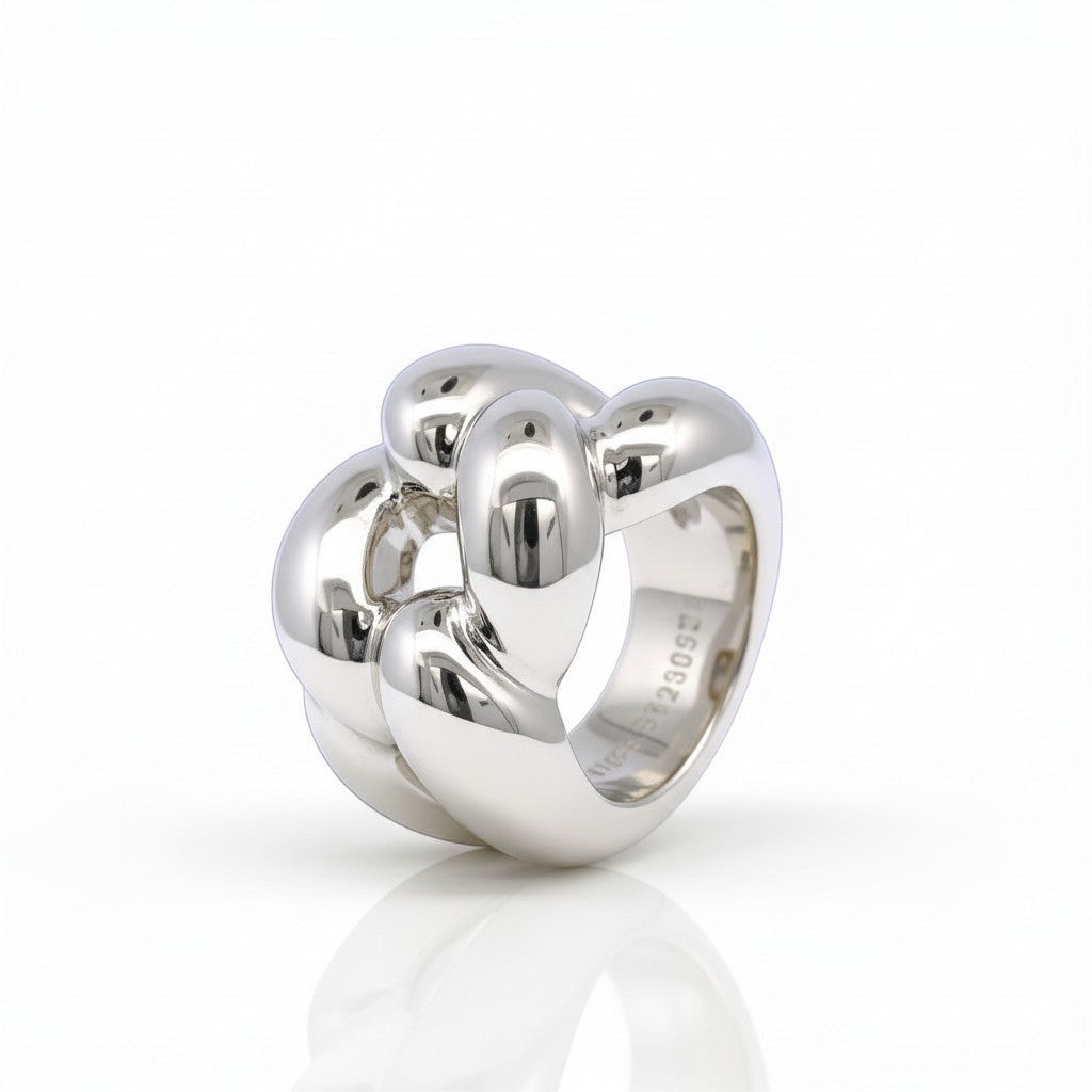 Sophia Schneider Joyas chunky braided ring in silver with rhodium plating. Size 11.