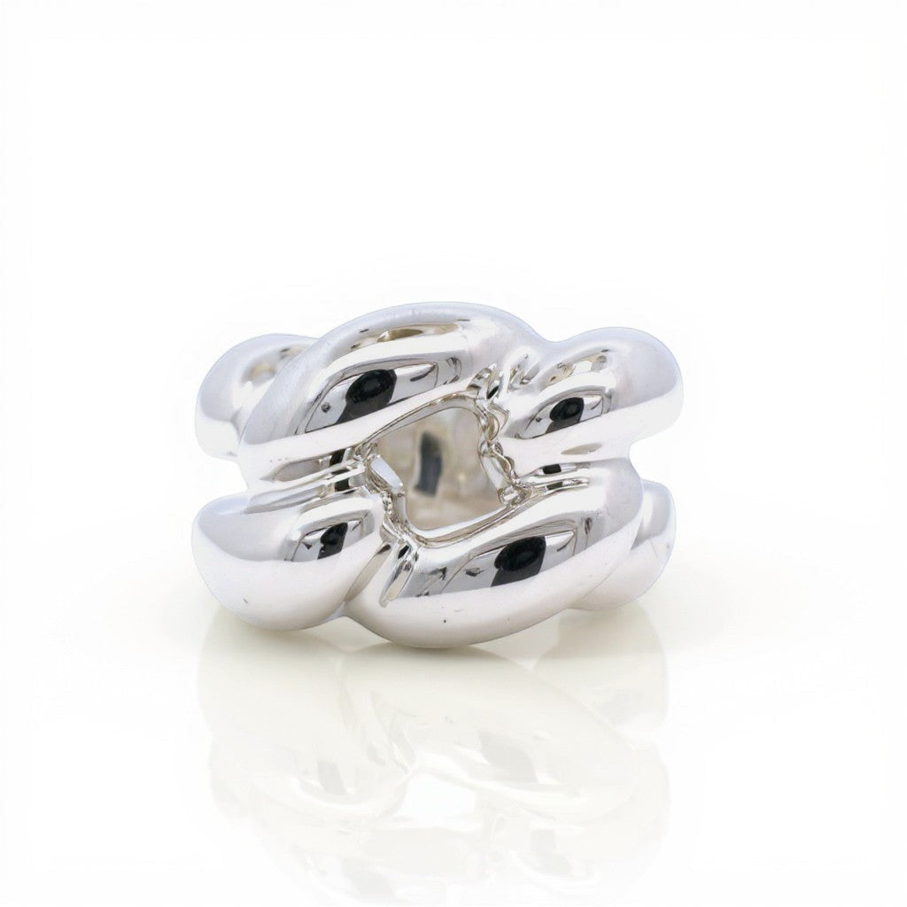 Sophia Schneider Joyas chunky silver ring with braided design, rhodium plated.