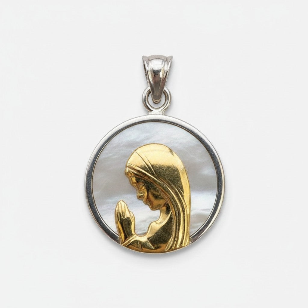 Sophia Schneider Joyas round medal featuring praying Virgin Mary in gold and mother of pearl, 20mm.