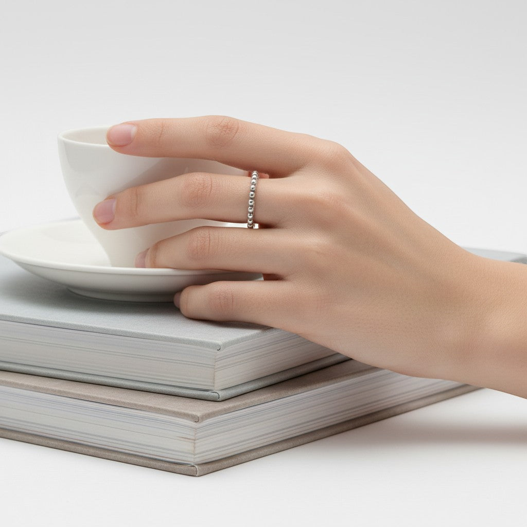 Sophia Schneider Joyas silver-plated rhodium ring with 12 small beaded details, size 11.