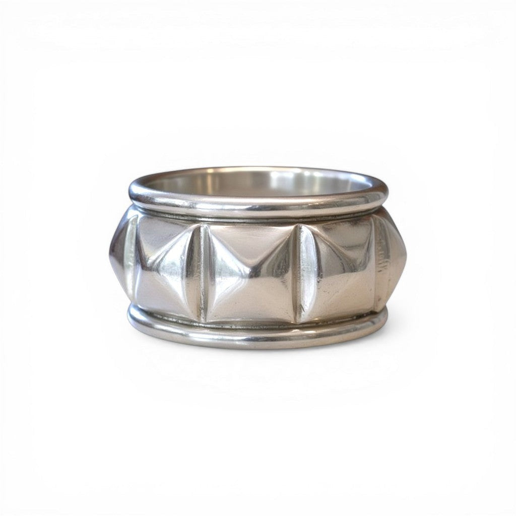 Sophia Schneider Joyas silver ring with pyramid stud design, rhodium plated, size 15.