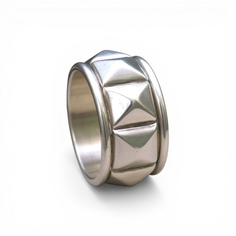 Sophia Schneider Joyas silver ring with pyramid stud design, rhodium plated, size 15.